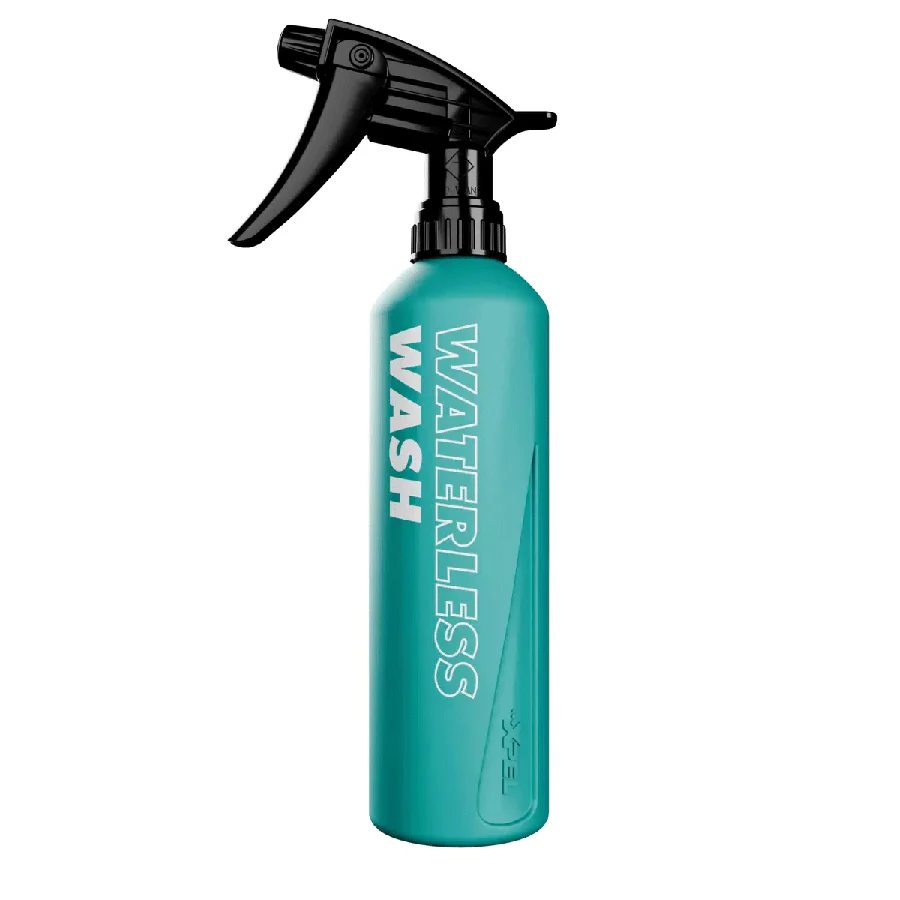 A spray bottle with the words " waterless wash ".